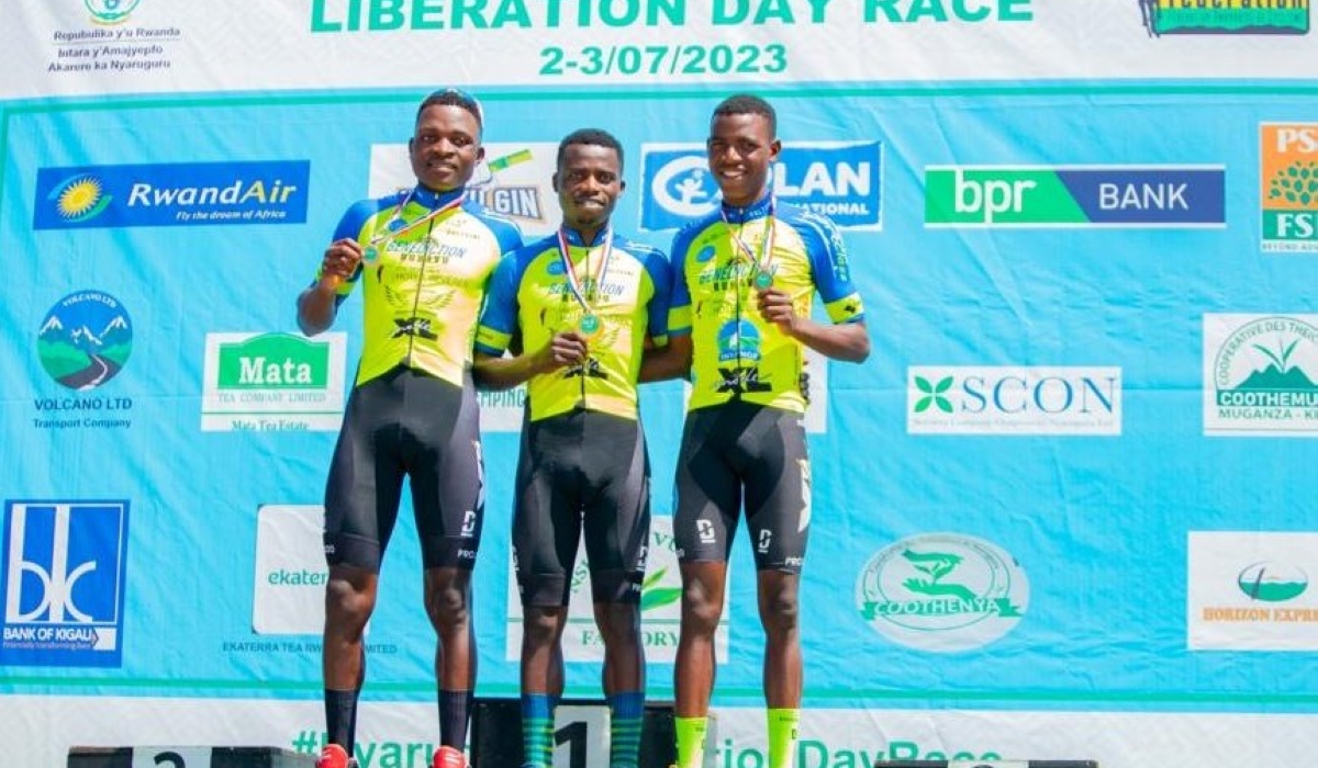 Moise Mugisha, the winner of Nyaruguru Liberation Day Race, along with the first runner-up Etienne Tuziyere (L) and second runner-up Eric Manizabayo, during the awards ceremony in Nyaruguru District, on Monday, July 3.