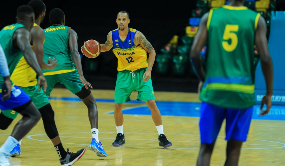 Rwanda&#039;s shooting guard Kenneth Gasana with the ball during a training session at BK Arena on February 8, 2021 (File)