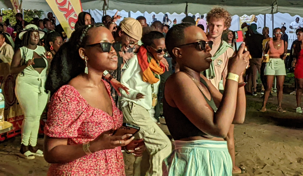 Revelers enjoy the rolling of  Kivu Fest concert, the annual festival that takes place at Kivu Public Beach at the shores of Lake Kivu in Rubavu District for two days. Photos by Germain Nsanzimana