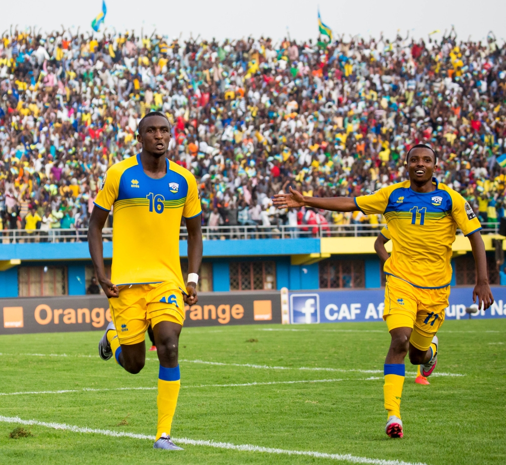 Amavubi striker Ernest Sugira and Savio Nshuti celebrate a goal during the CHAN 16