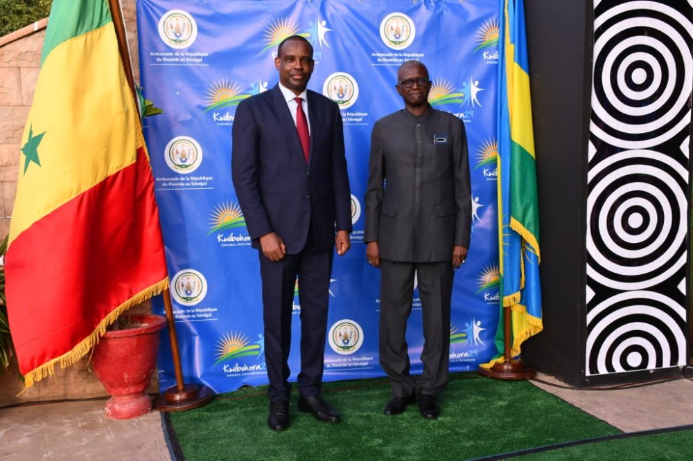 Amb Jean Pierre Karabaranga and another friend of Rwanda, Brig Gen El Hadji Babacar Faye, a retired Senegalese officer who served as a peacekeeper in Rwanda during the 1994 genocide against the Tutsi, during the liberation day anniversary in Dakar on Tuesday, July 4, 2023.