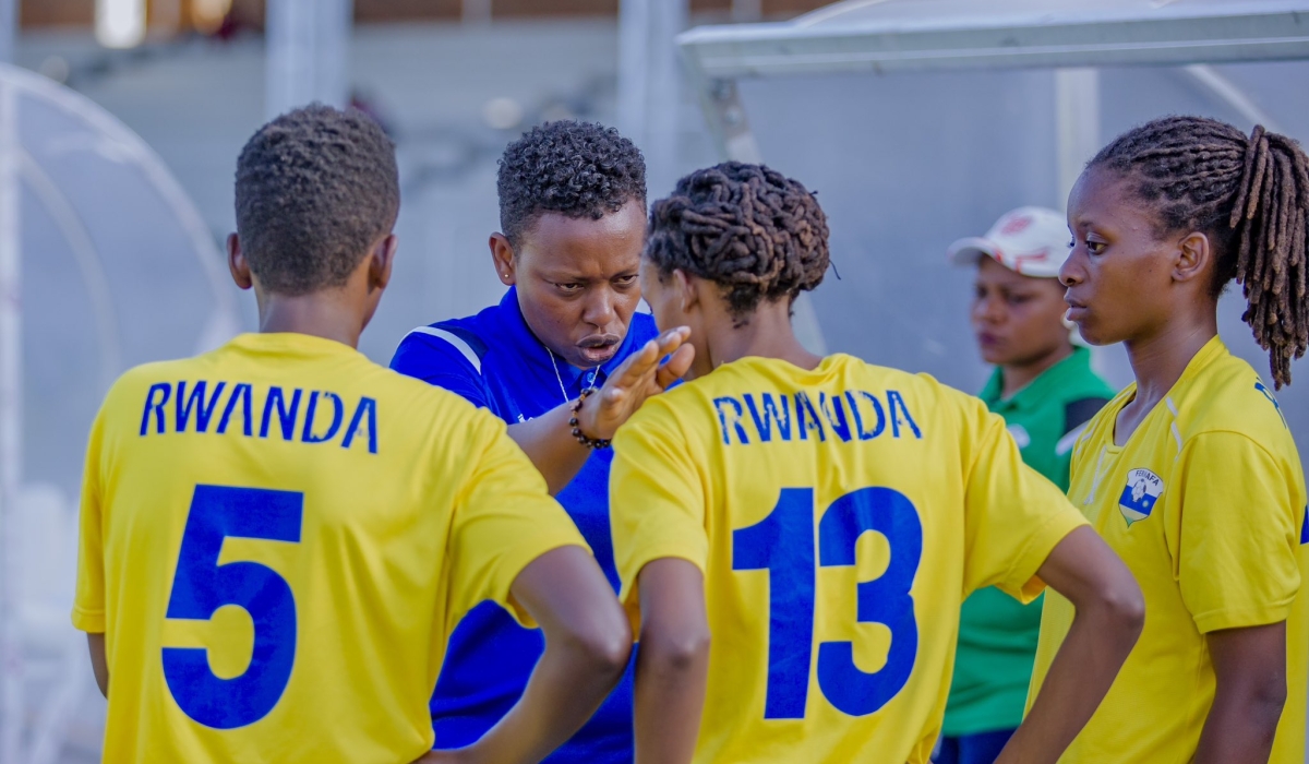 National football women&#039;s team head coach Grace Nyinawumuntu gives instructions to players during a training session on July 4. Courtesy
