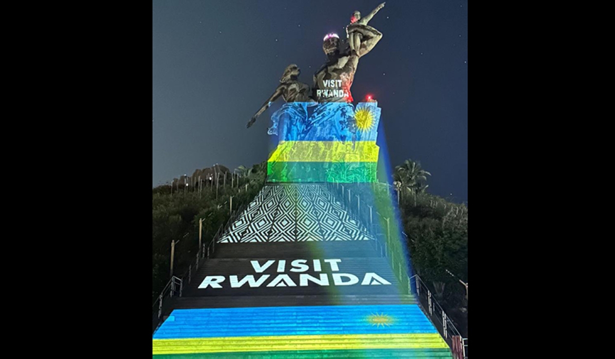 The African Renaissance Monument shines in the vibrant colors of Rwanda during the 29th Liberation Anniversary celebration.