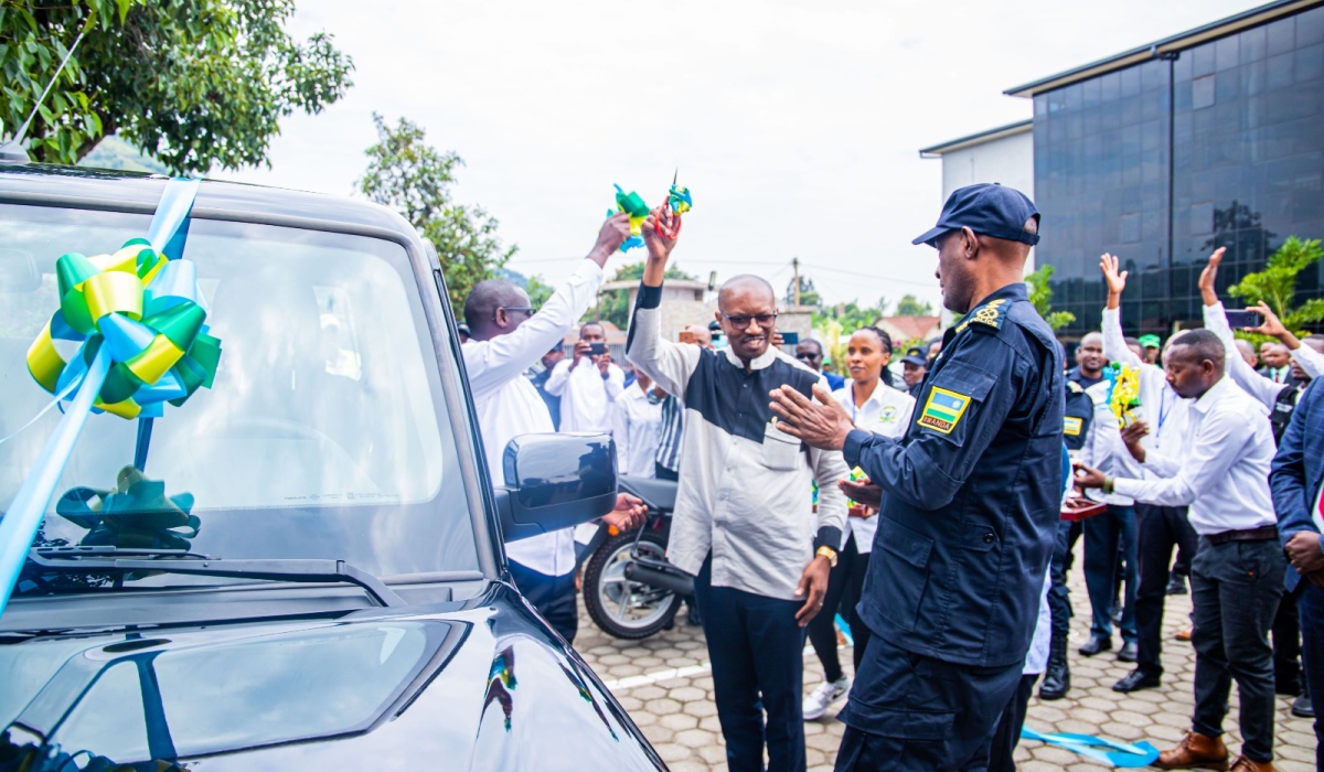 Minister of Interior, Alfred Gasana hands over car keys to the executive secretary of Rubavu sector in Rubavu District on July 7.
