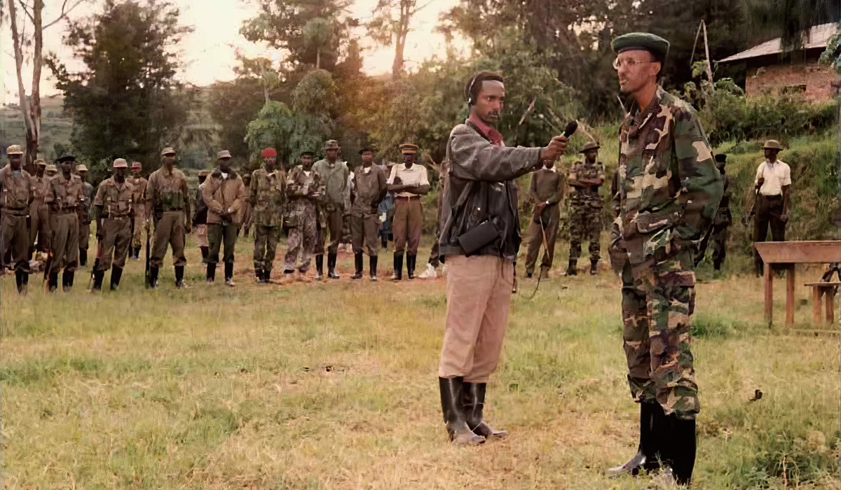 The Chairman of the RPA High Command, Paul Kagame, speaks to Muhabura Radio reporter Anaclet Kalibata during the liberation struggle. COURTESY