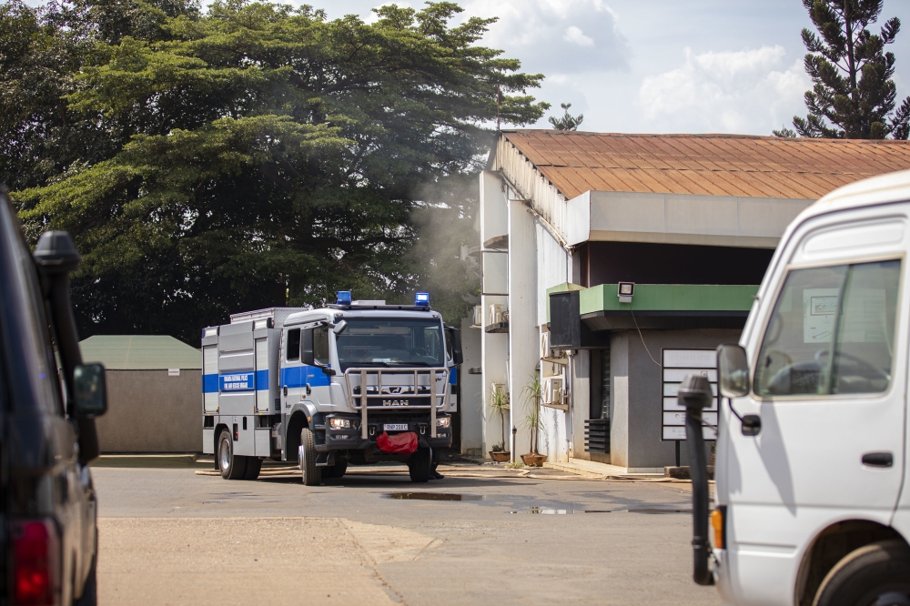 Rwanda National Police (RNP)'s Fire and Rescue Brigade managed to extinguish a building block that houses the former office of  Imvaho Nshya that was gutted by fire Tuesday, July 11. Photo by Christianne Murengerantwari