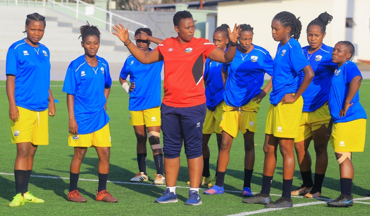 Amavubi women&#039;s team head coach Grace Nyinawumuntu gives instructions to the players during a training session at Kigali Pele Stadium. COURTESY