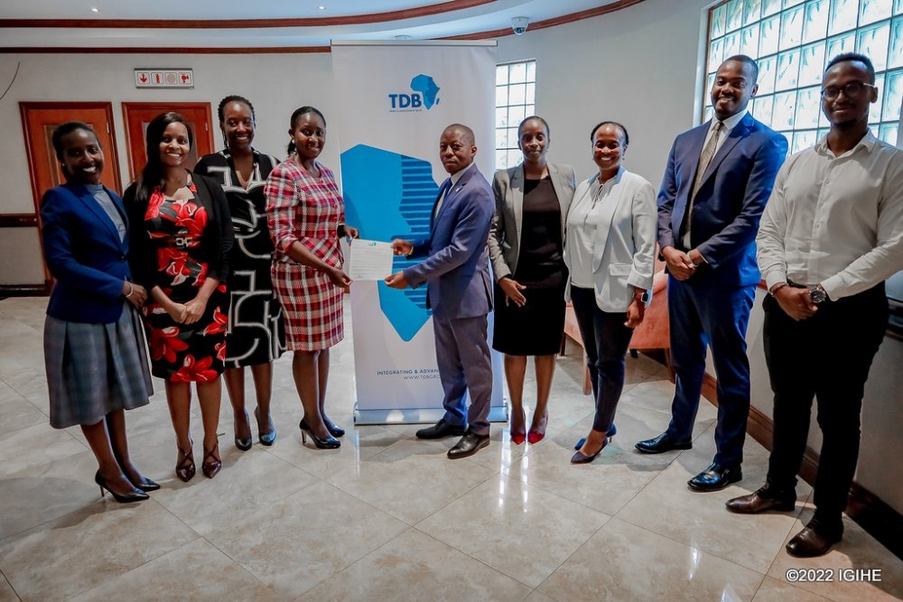 The CEO of Agaciro Development Fund, Gilbert Nyatanyi, with the Group Executive Corporate Affairs and Investor Relations of TDB, Mary Kamari, during the announcement of the fund’s $8.1 million investment in the regional bank. PHOTO BY IGIHE