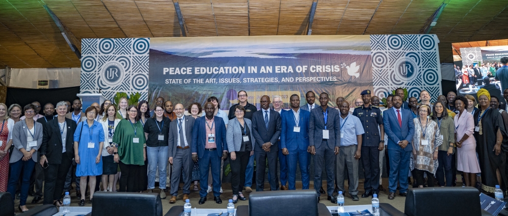 Delegates pose for a group photo at the conference   on the most effective approaches to address conflicts, promote human well-being, and achieve sustainable peace on Tuesday,July 12. All photos by Emmanuel Dushimimana