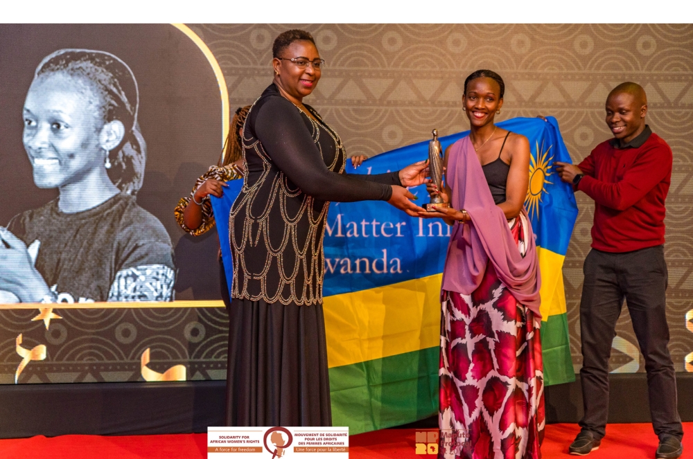 Divine Ingabire, the founder and executive director of I Matter receives the award at the 20 for 20 Solidarity Award in Nairobi, Kenya on Tuesday, July 11. Courtesy