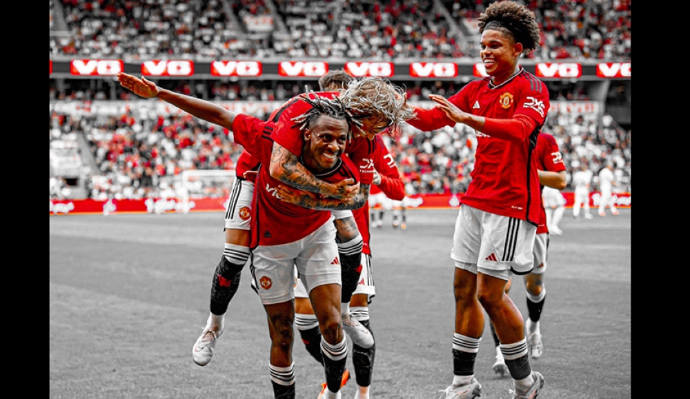 Rwandan wonderkid Noam Emeran celebrates with his teammates. He  was on target for Manchester United as they beat Leeds United 2-0  in a preseason friendly on Wednesday, July 12.  Courtesy