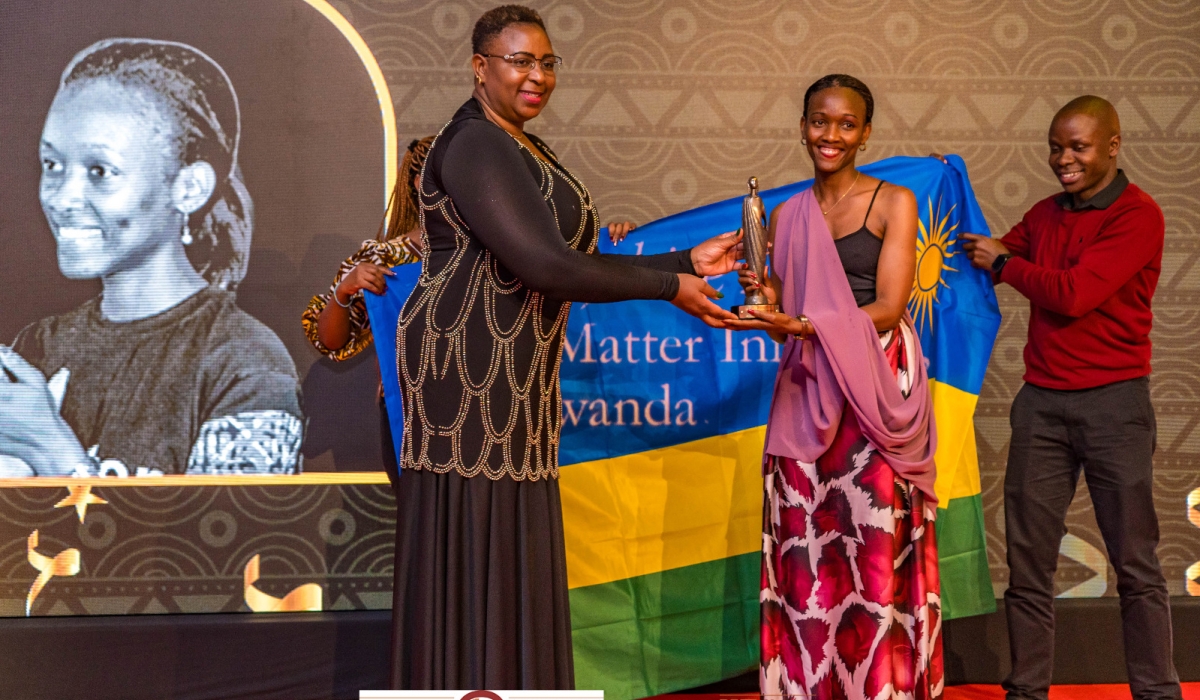Divine Ingabire, the founder and executive director of I Matter receives the award at the 20 for 20 Solidarity Award in Nairobi, Kenya on Tuesday, July 11. Courtesy