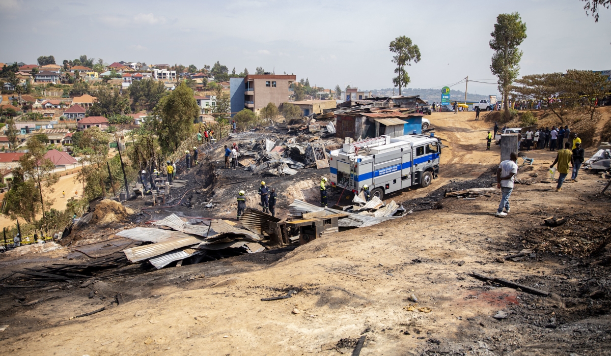 Rwanda National Police (RNP) Fire and Rescue Brigade officers helped put out a massive fire that gutted workshops in the Zindiro area of Kigali on Tuesday, July 11. Photo by Christianne Murengerantwari.