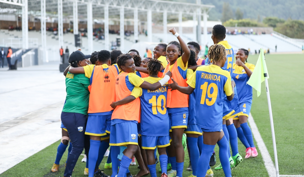 Amavubi women&#039;s team players celebrate after a 3-3 draw against Uganda at Kigali Pele Stadium. All Photos by Dan Gatsinzi