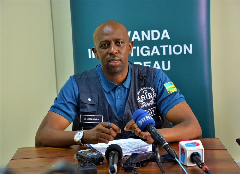 RIB&#039;s spokesperson Thierry Murangira speaks to journalists said   the suspect was caught red-handed after withdrawing Rwf 5 million from a mobile money agent. File