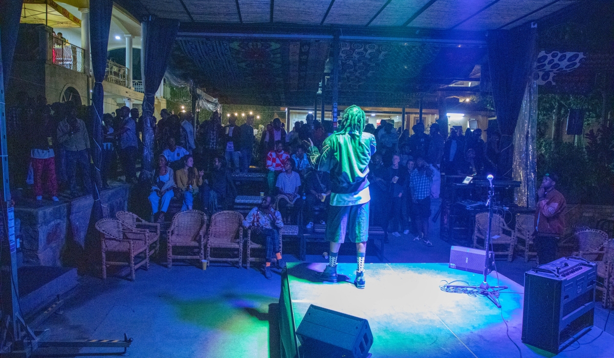 A local artiste during a performance in one of pubs in Kigali.Craish Bahizi
