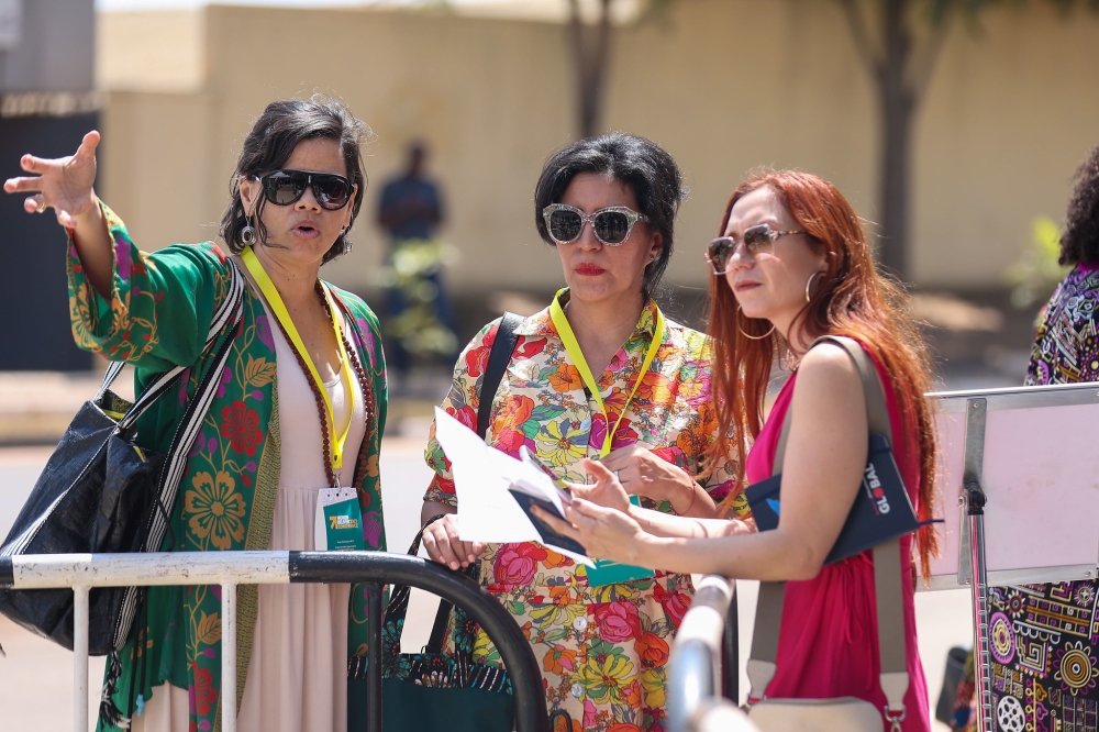  Enthusiastic delegates who descend on Kigali for Women Deliver Conference, seen here interact at BK Arena