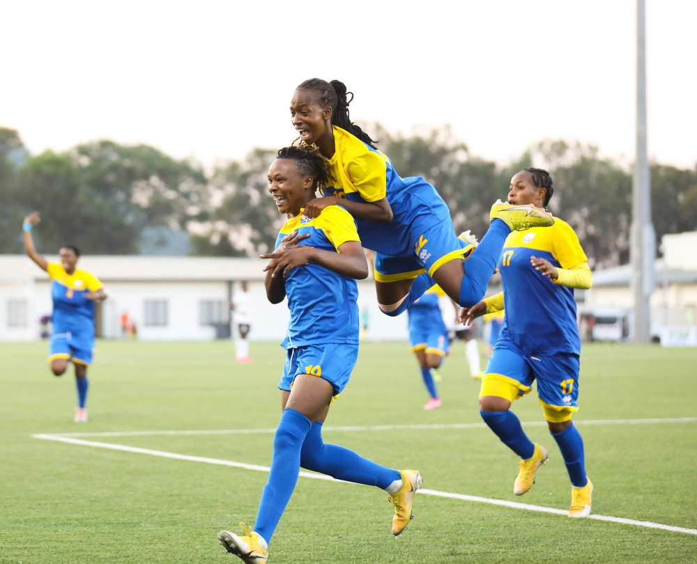 Amavubi women&#039;s team players celebrate during a 3-3 draw in  the first leg match against Uganda at Kigali Pele Stadium. The two teams will play the second leg game on Sunday, July 16. Dan Gatsinzi