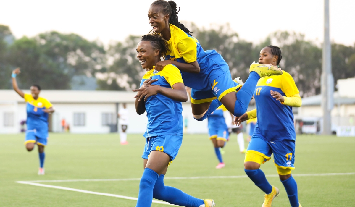 Amavubi women&#039;s team players celebrate during a 3-3 draw in  the first leg match against Uganda at Kigali Pele Stadium. The two teams will play the second leg game on Sunday, July 16. Dan Gatsinzi