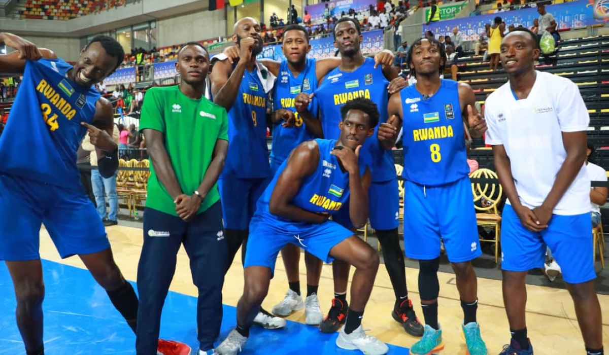 Players celebrate after winning  a third place following  a 82-73 win over  DR Congo at  2023 FIBA AfroCAN campaign   in Luanda. COURTESY