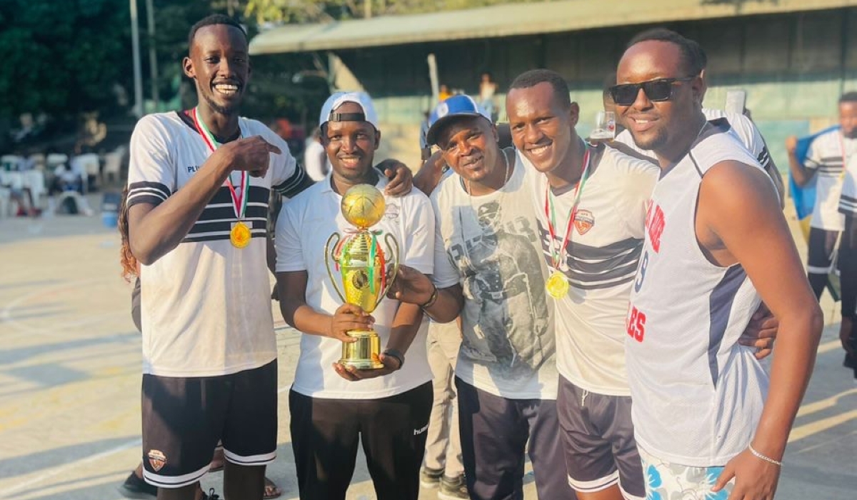 APR VC players celebrate after winning the Amical des Sportifs trophy in Bujumbura on Sunday, July 16. COURTESY 