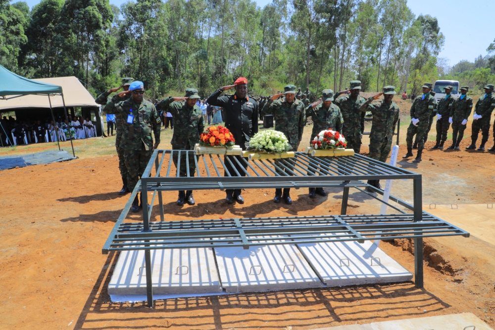 Rwanda Defence Force officers pay tribute to the Rwandan Peacekeeper Sgt Eustache   Tabaro who recently lost his life in the Central African Republic. Sgt Tabaro was laid to rest in full military honors at Kanombe Military Cemetery on Tuesday, July 18.  . Courtesy