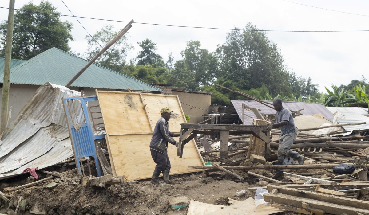 Residents try to salvage some of the properties after the disasters on May 3. The government is seeking Rwf518.58 billion (approximately US$415 million) to facilitate the recovery from disasters. Germain Nsanzimana