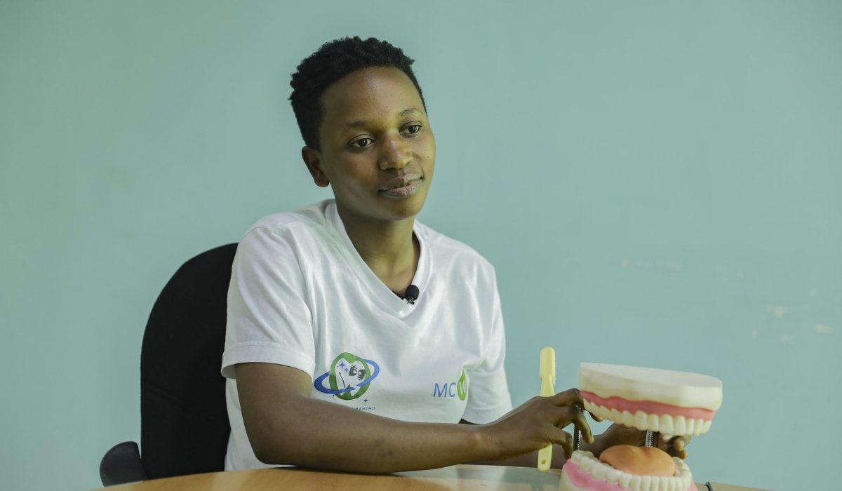 A dental therapist, 26-year-old, Esperance Niyigena during an interview. She has observed how difficulties in communication and language barriers can impede individuals from accessing or delivering services. Emmanuel Dushimimana