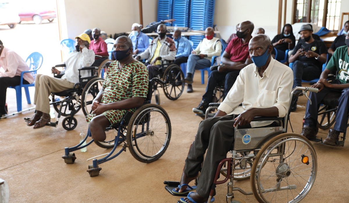 People with disabilities during a meeting at Nyarugunga Sector. Senators are advocating for an expedited count and categorisation of people with disabilities to ensure adequate support for their unique requirement. CRAISH BAHIZI
