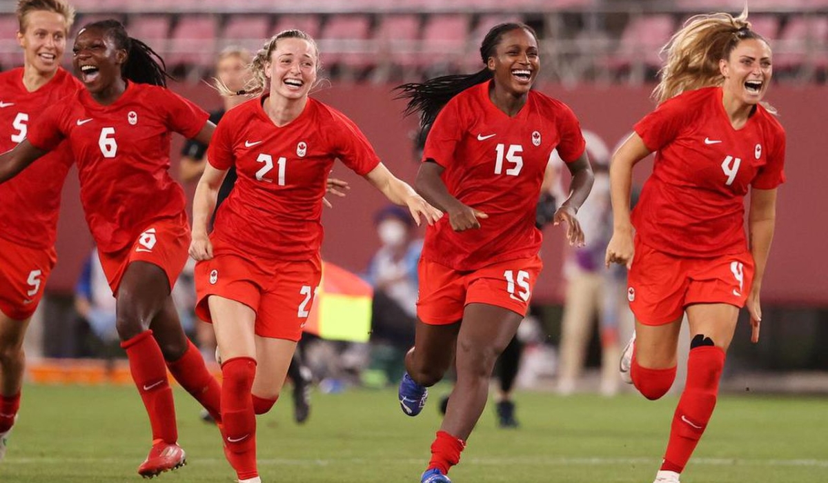 Canada women&#039;s team players celebrate during the match. Canada holds the largest attendance in women&#039;s world cup history. INTERNET PHOTO