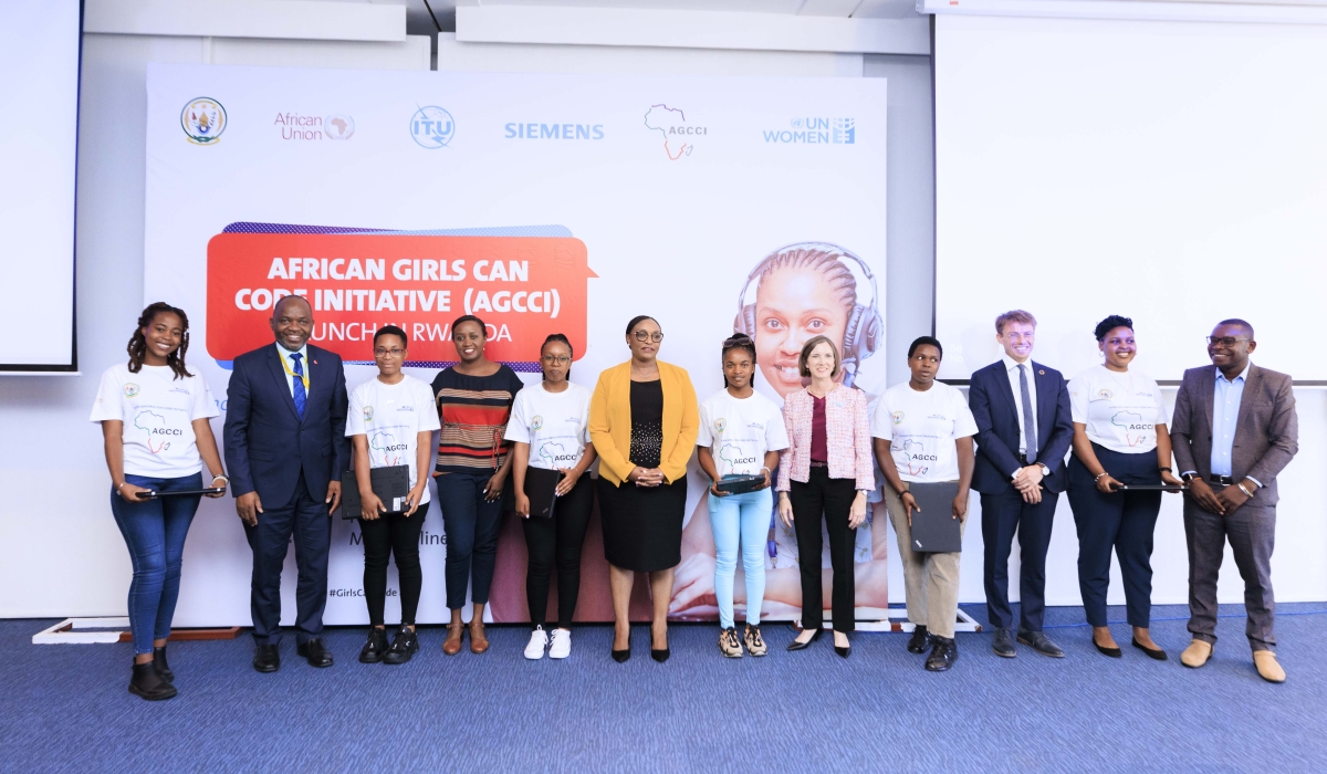 Minister of Education, Valentine Uwamariya with other delegates pose for a group photo at the event