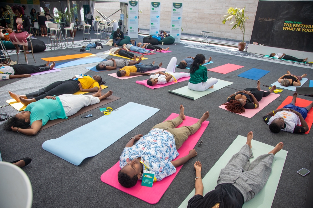 Women Deliver Conference delegates on July 19, practiced Yoga exercise as one of the side events of the conference.