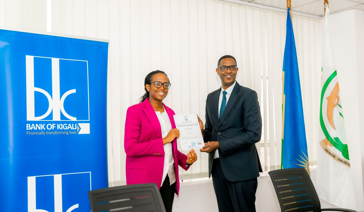 Bank of Kigali Chief Executive Officer, Dr. Diane Karusisi and Col. David Kanamugire, CEO of The National Cybersecurity Authority (NCSA), during the handover ceremony. COURTESY PHOTOS