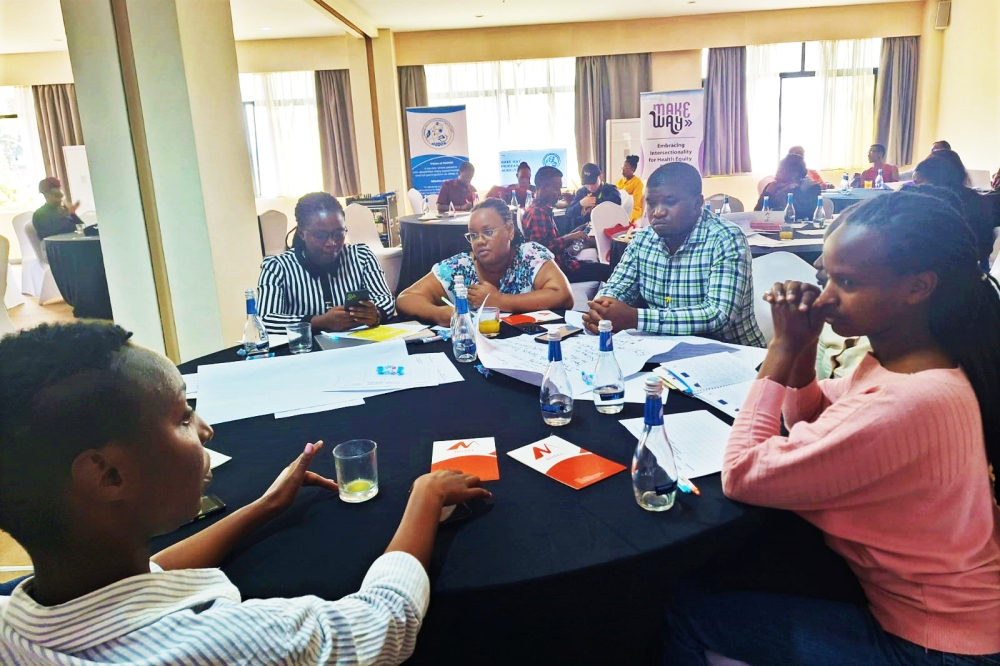 Patrick Tuyishimire with his fellows during a group discussion in the workshop.