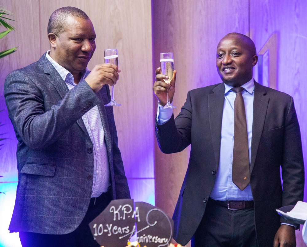 The Permanent Secretary in the Ministry of Infrastructure (Righ), and  Abiel Abimana Benjamin Tayari, Chairman of Kenya Port Authority toast during the celebration of the 10th Anniversary of Kenya Port Authority's services in Rwanda. 