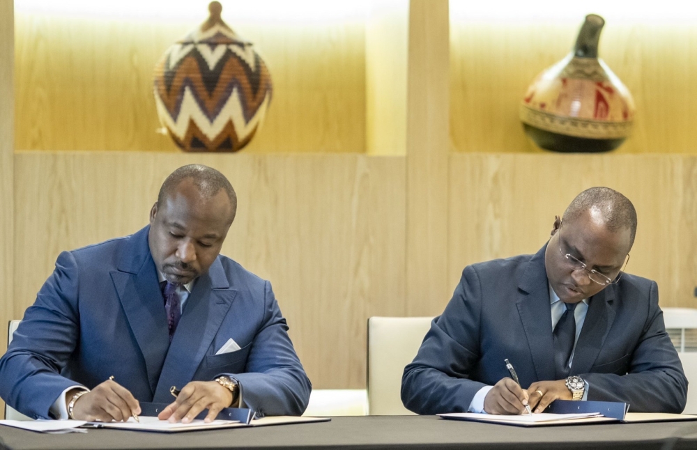 Minister of Trade Jean Chrysostome Ngabitsinze and Minister of International Cooperation in Congo-Brazzaville, Denis Christel Sassou Nguesso sign the agreement on July 22. Courtesy