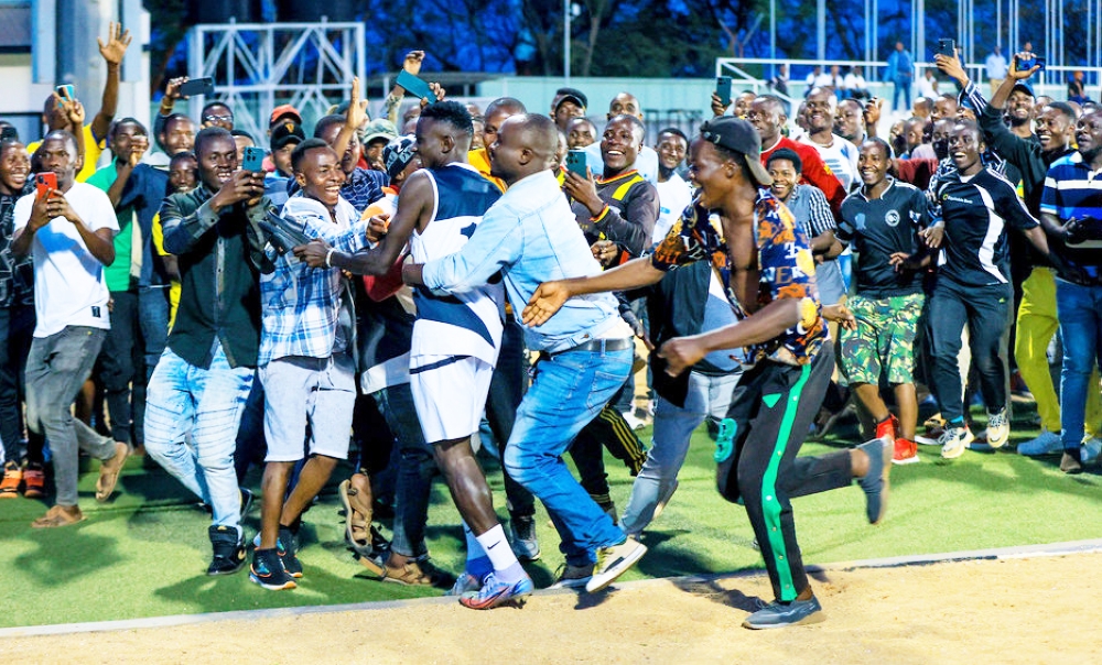 APR FC fans cheer on the new players during the first training session with the new head coach at Kigali Pele Stadium on Friday, July21. Photo by Julius Ntare (Igihe)