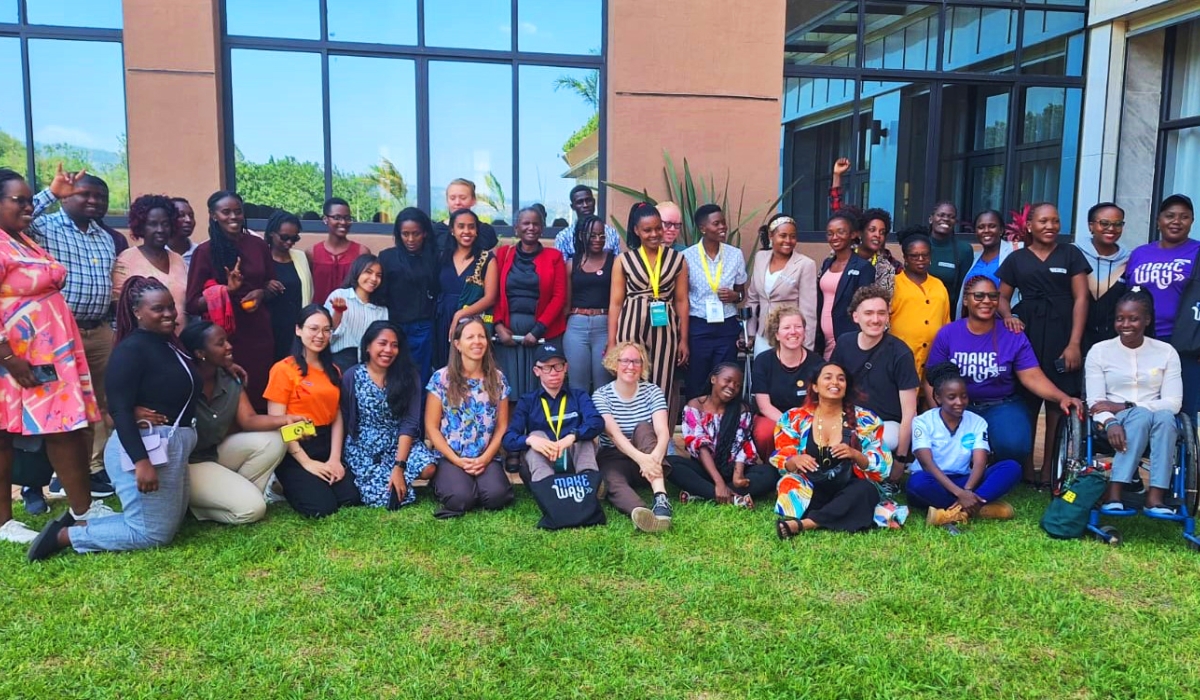 Participants pose for a group photo after conducting a workshop on disability and SRHR  at M Hotel in Kigali on Friday, July 21. Courtesy