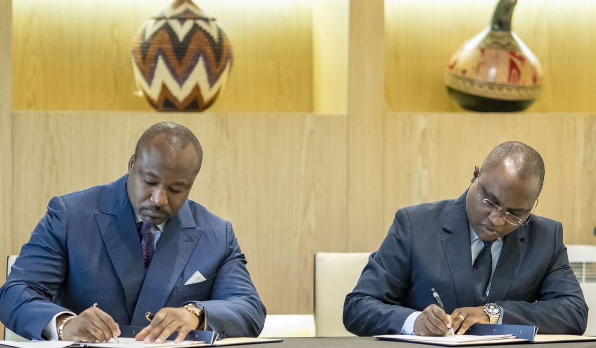 Minister of Trade Jean Chrysostome Ngabitsinze and Minister of International Cooperation in Congo-Brazzaville, Denis Christel Sassou Nguesso sign the agreement on July 22. Courtesy
