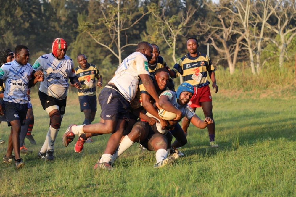 Lion de Fer fight for the ball against Kigali Sharks during a friendly game on Saturday. Kigali Sharks emerged victorious with a 18-17 win over Lions de Fer. Lions de Fer were on Saturday, July 22, crowned 2022/23 Rwanda Rugby League champions for the second time in a row, after finishing the campaign unbeaten. Courtesy