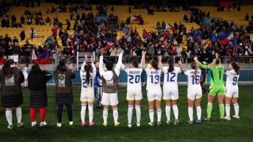 The Philippines players celebrate with their fans after the game. FIFA via Getty Images