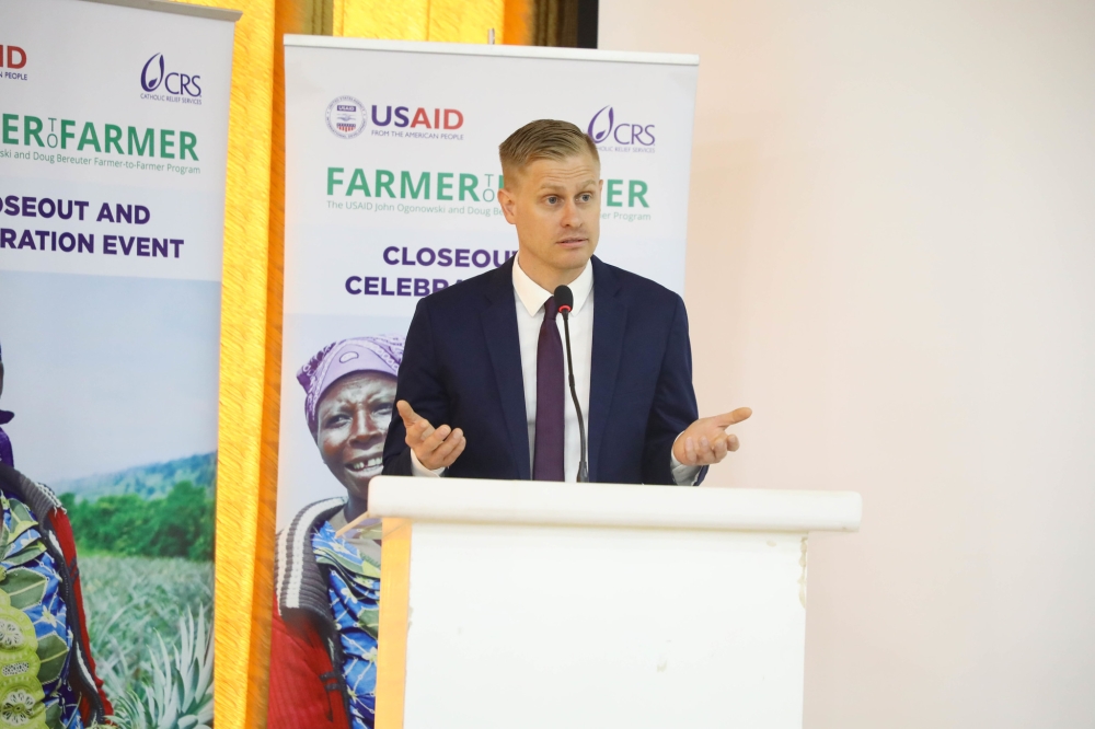 Country Representative, Hans Fly, delivers remarks during the event to celebrate   farmer to farmer  project achievements