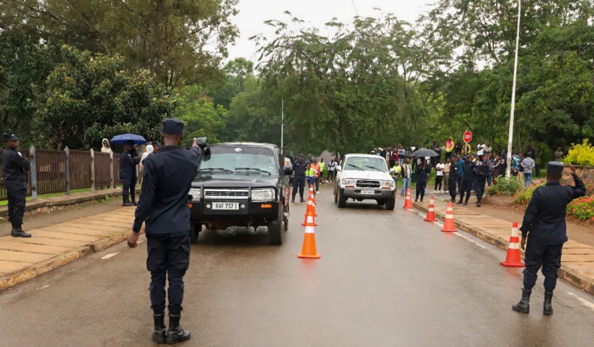 Traffic police officers invigilate a driving test exam in Kigali. The government is nearing the completion of plans to implement automatic driving tests and issue related licenses. COURTESY
