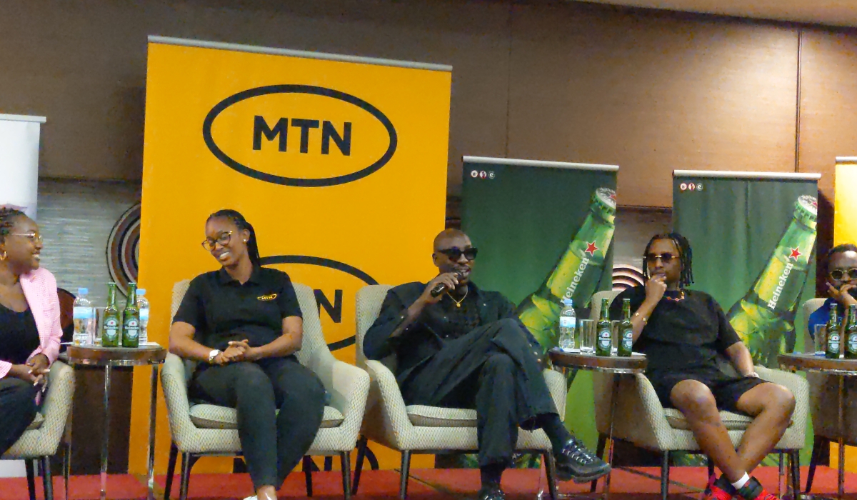 Kenyan singer Bien-Aimé (C) and DJ Marnaud (R) during the press conference.