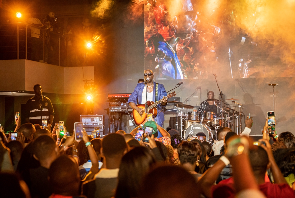 Kenyan singer and former Sauti Sol member, Bien-Aimé Baraza during his solo performance in Kigali on July 28. All photos by Willy Mucyo