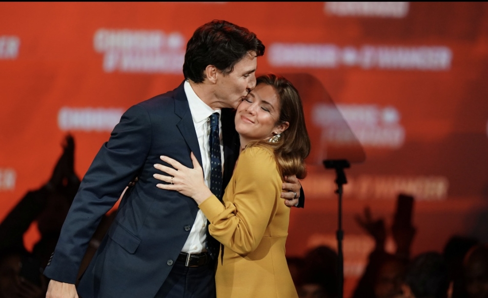 Canadian Prime Minister Justin Trudeau kisses his wife, Sophie Gregoire Trudeau, in Montreal after the federal election in October 2019. Photo Reuters.
