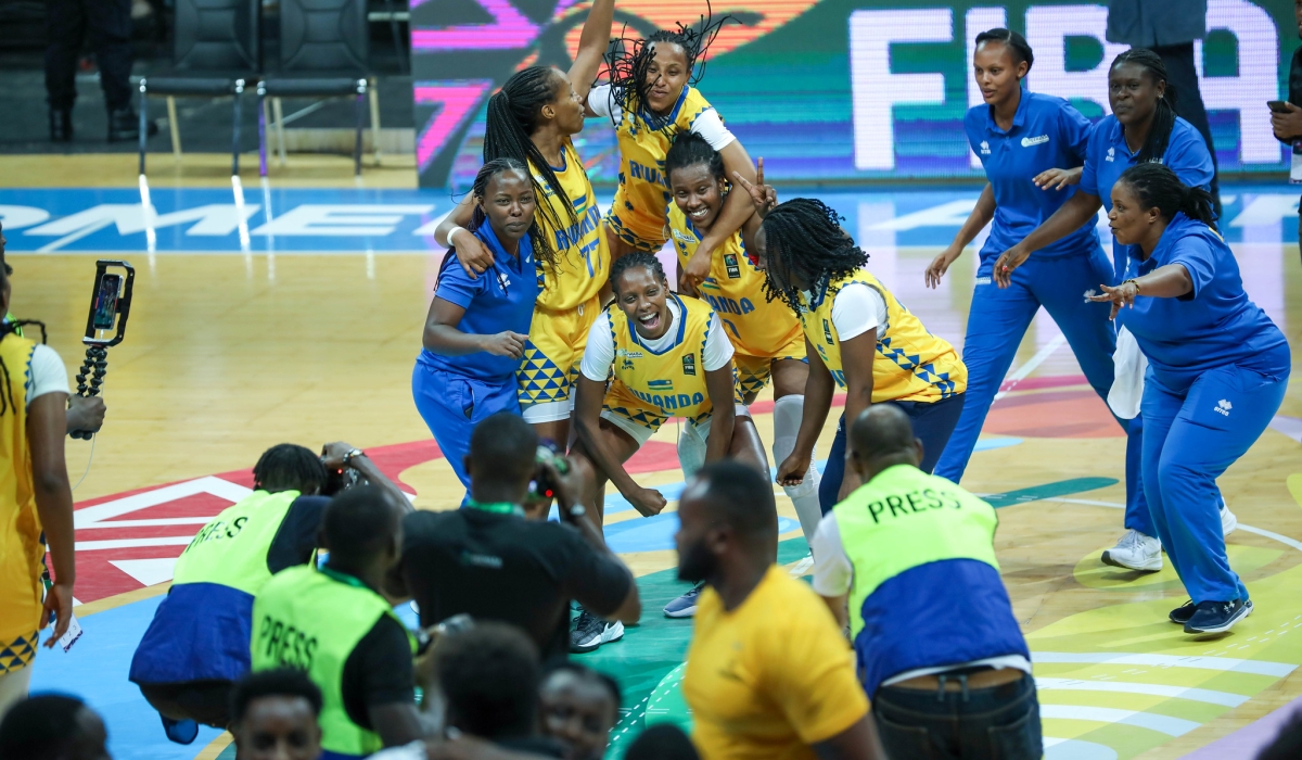 National Basketball women&#039;s team players celebrate the crucial victory. Rwanda qualified to the semifinals of the FIBA Women’s Afrobasket after beating Uganda 66-61 in a tense quarterfinal clash held at BK Arena on Wednesday night.
