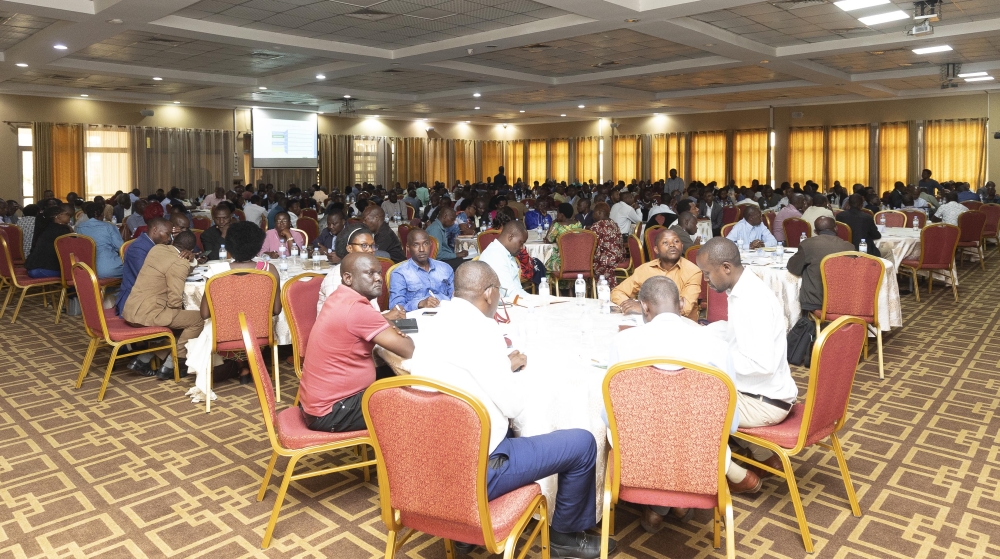 Head teachers from different schools attentively listening to the speaker during the RwandaEQUIP workshop at Lemigo Hotel on August 2