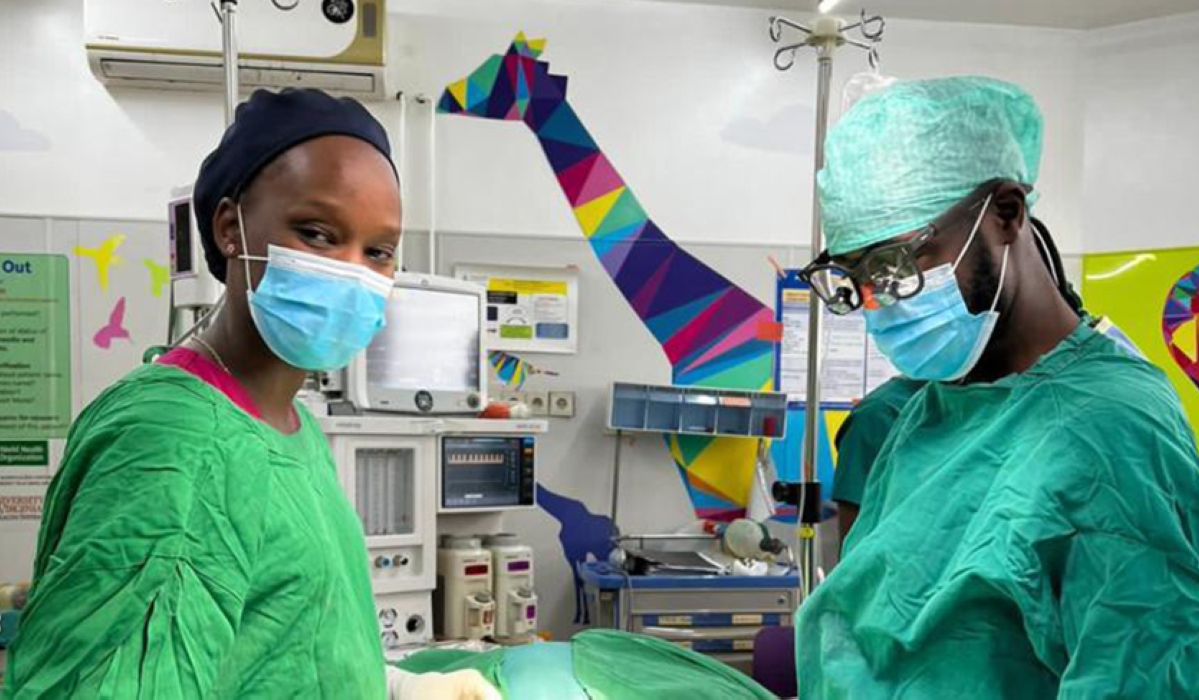 Dr Axwlle Nduwimana in an operation room preparing for surgery.