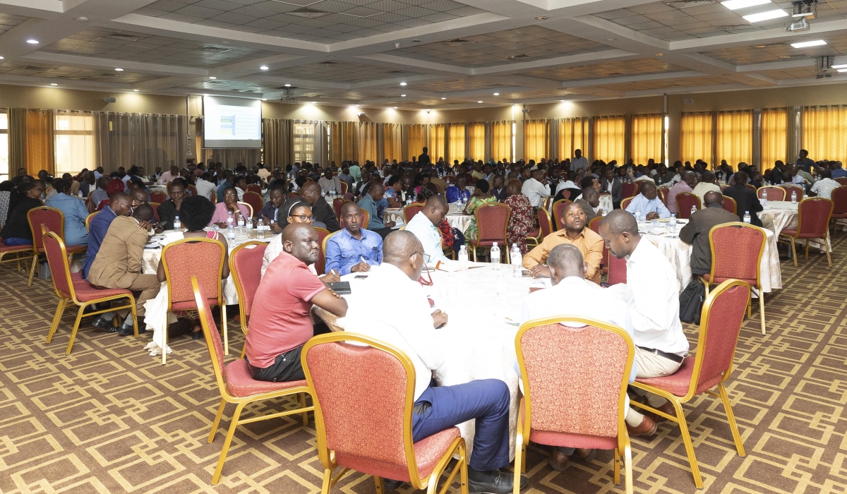 Head teachers from different schools attentively listening to the speaker during the RwandaEQUIP workshop at Lemigo Hotel on August 2